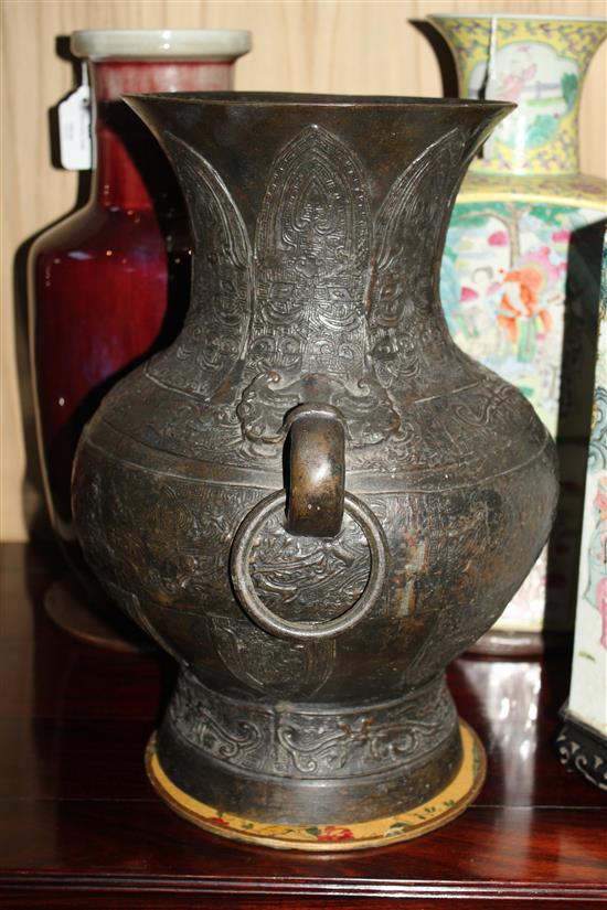 A large Chinese archaistic bronze vase, Hu, Ming dynasty, 38cm, old repairs